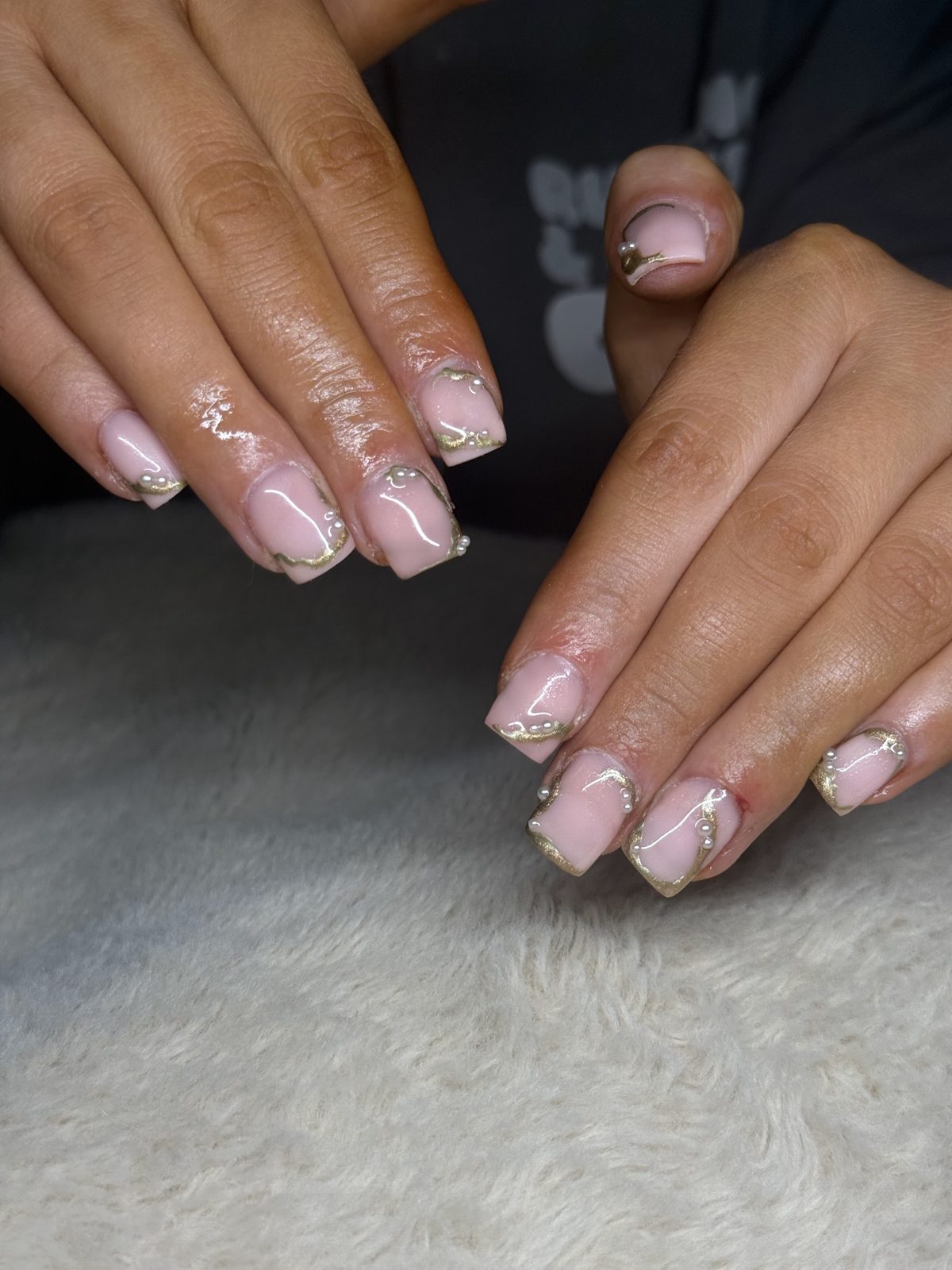 Pale nails with gold detail