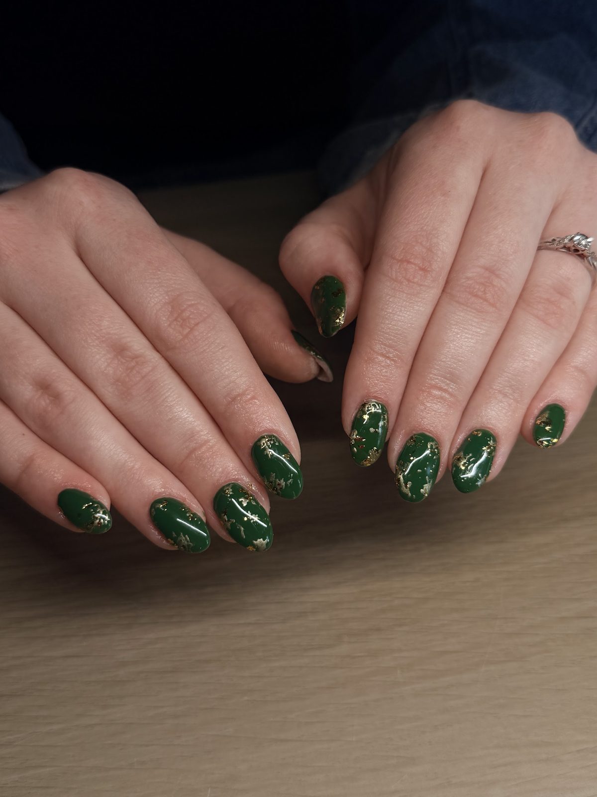 Green nails with gold detail